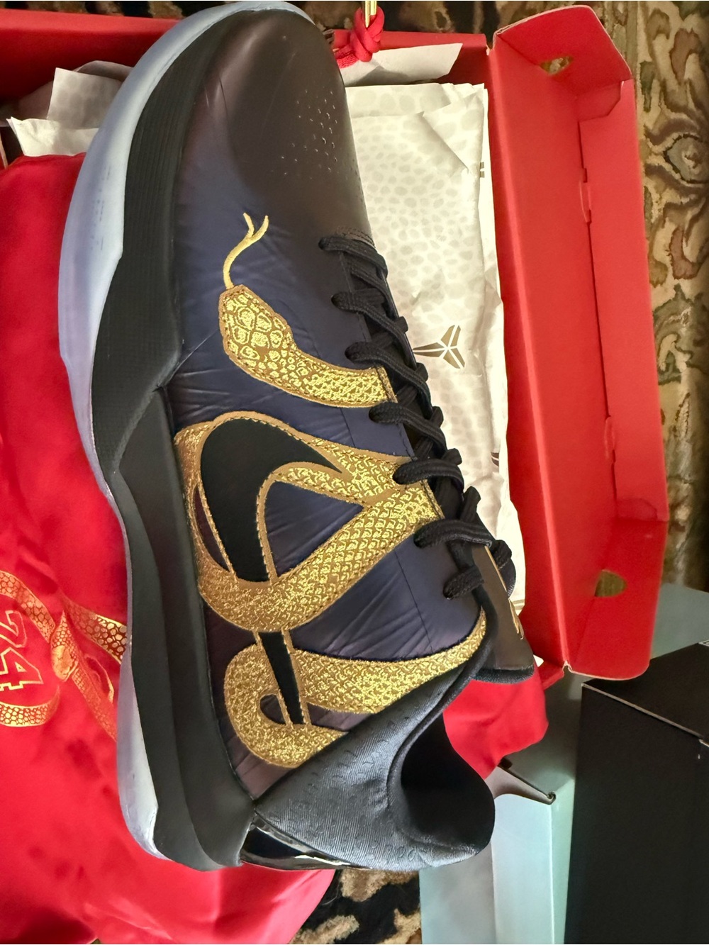 Nike Men's Black and Gold Athletic Shoes with Snake Detail